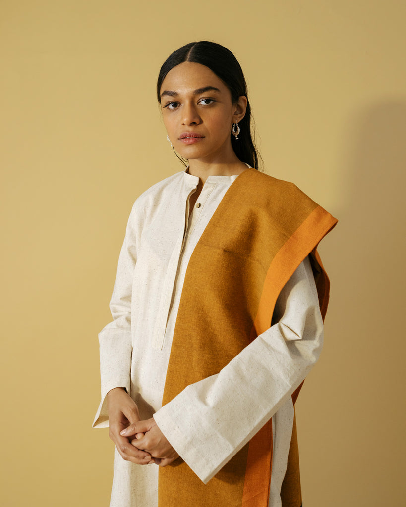 White kurta with straight pants & a contrasting  shawl