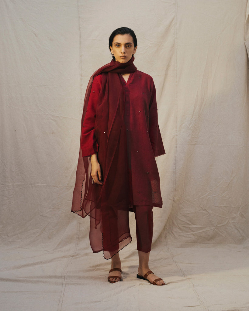 Deep red frayed kamiz & pants with dupatta